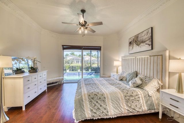 bedroom featuring dark wood-type flooring, ceiling fan, ornamental molding, and access to outside