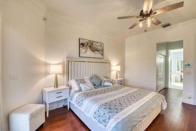 bedroom with crown molding, ceiling fan, dark hardwood / wood-style flooring, and a closet