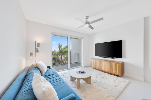 living room featuring ceiling fan