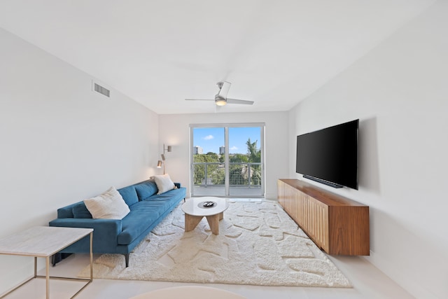 living room featuring ceiling fan