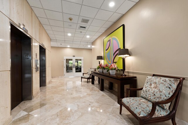 playroom featuring a paneled ceiling, light tile patterned floors, and billiards