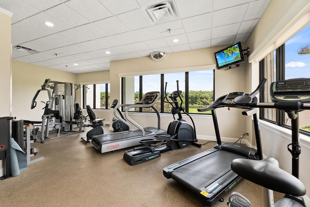 gym with a drop ceiling