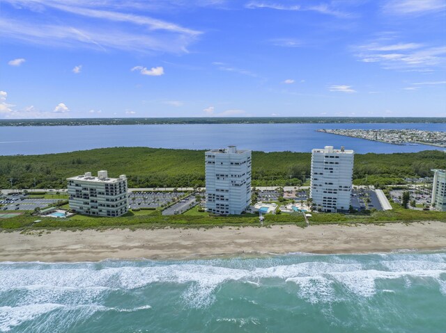 aerial view with a beach view and a water view