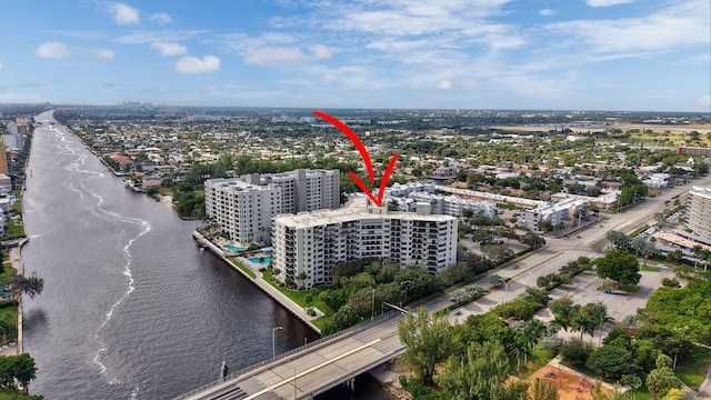 birds eye view of property featuring a water view