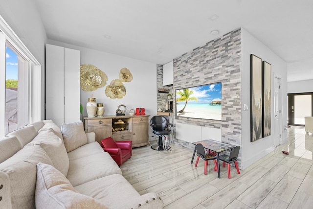 living room with light hardwood / wood-style floors