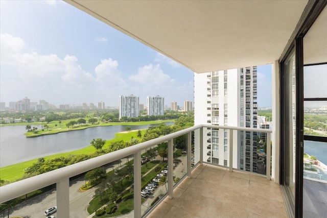 balcony featuring a water view