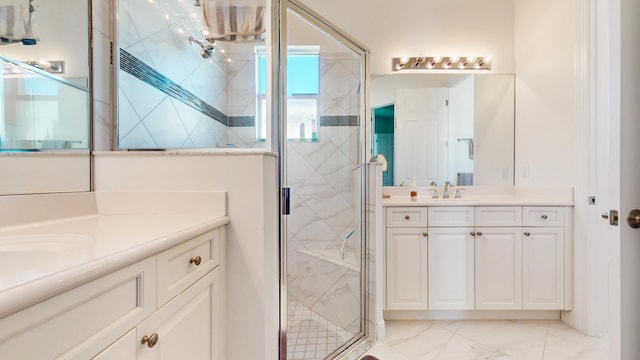 bathroom with vanity and walk in shower