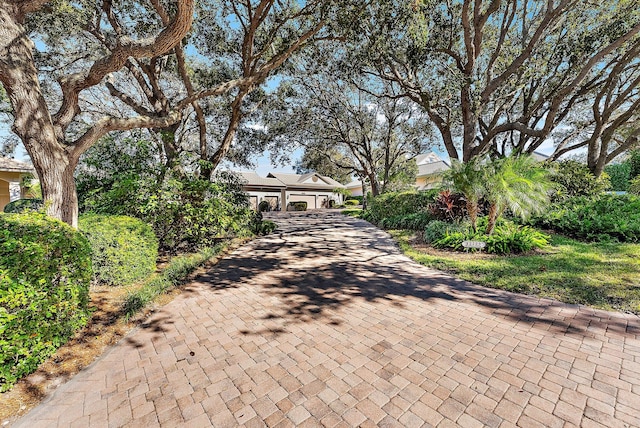 view of property hidden behind natural elements