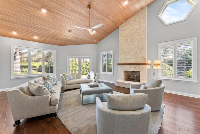 living room with dark hardwood / wood-style flooring, high vaulted ceiling, and wooden ceiling