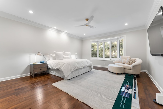 bedroom with hardwood / wood-style flooring, ceiling fan, and ornamental molding