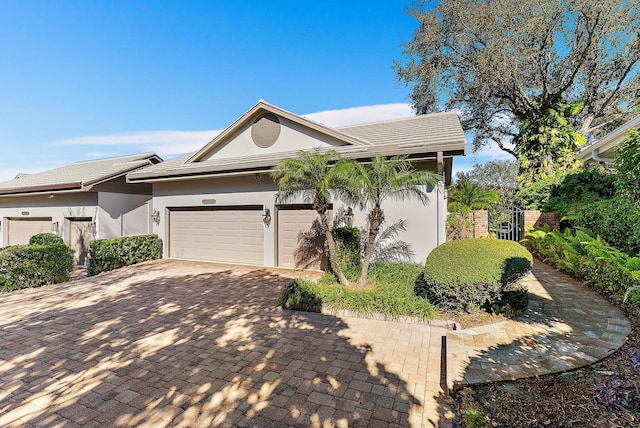 view of front of property with a garage