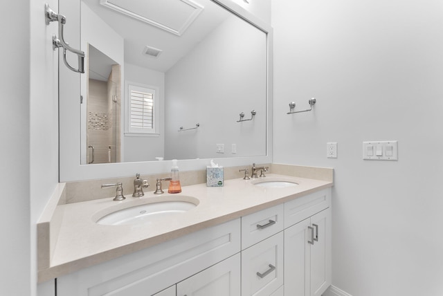 bathroom featuring vanity and walk in shower