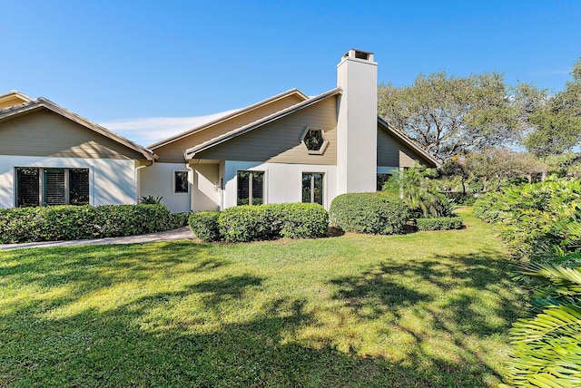 exterior space with a front lawn