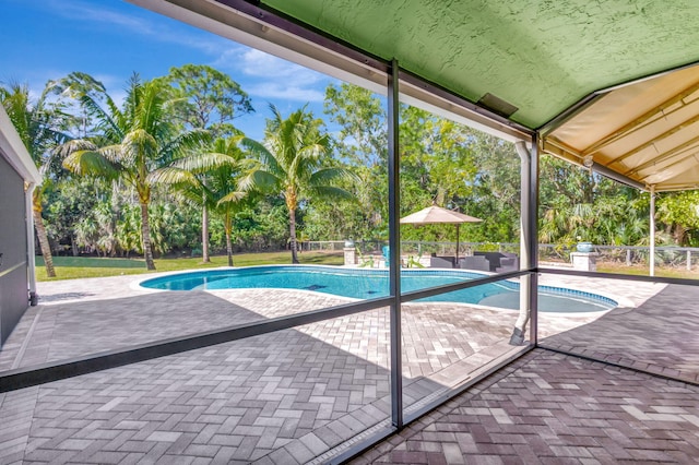 view of pool featuring a patio area