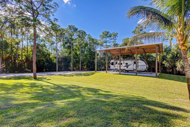 view of yard featuring a carport