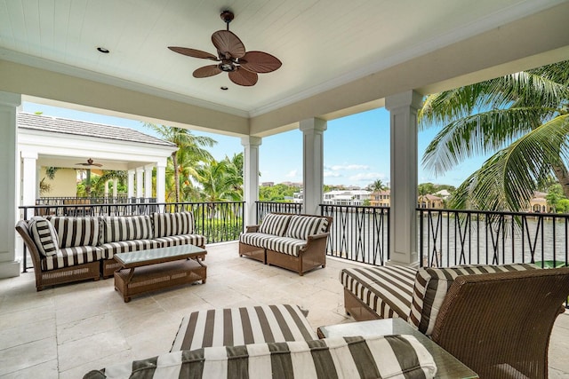 view of patio with outdoor lounge area and ceiling fan