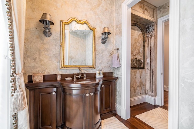 bathroom featuring hardwood / wood-style floors and vanity