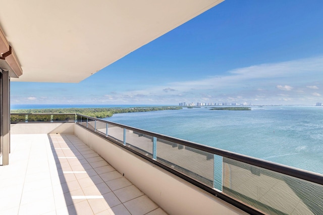 balcony featuring a water view