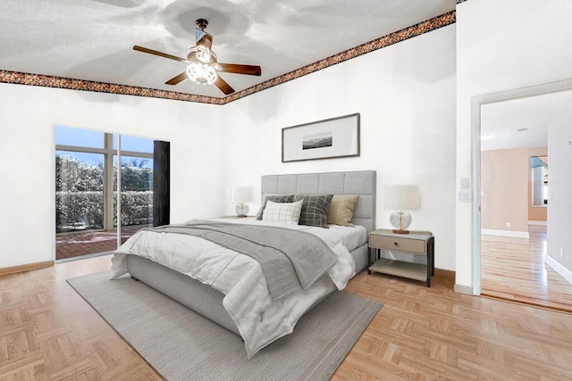 bedroom with access to outside, ceiling fan, and light parquet flooring