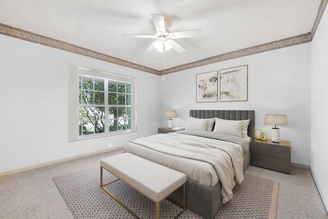 bedroom with ceiling fan and carpet floors