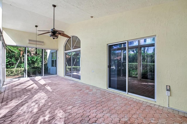 view of patio / terrace featuring ceiling fan