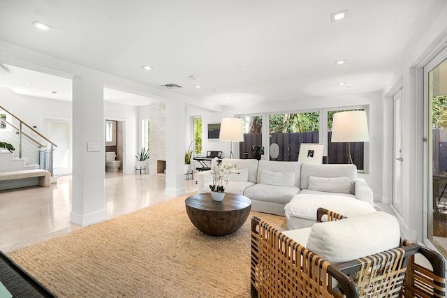 living room with light tile patterned floors