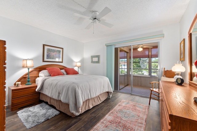 bedroom featuring a textured ceiling, ceiling fan, dark wood-type flooring, and access to outside