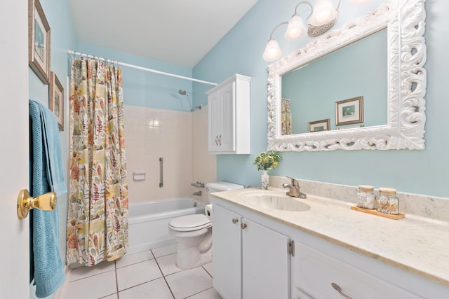 full bathroom featuring tile patterned flooring, vanity, toilet, and shower / bath combo with shower curtain