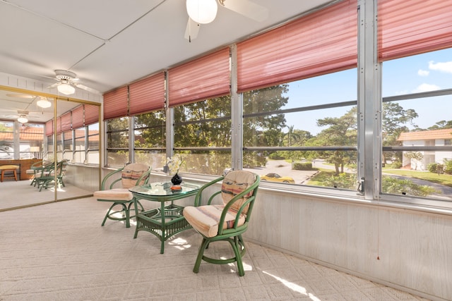 sunroom / solarium with ceiling fan