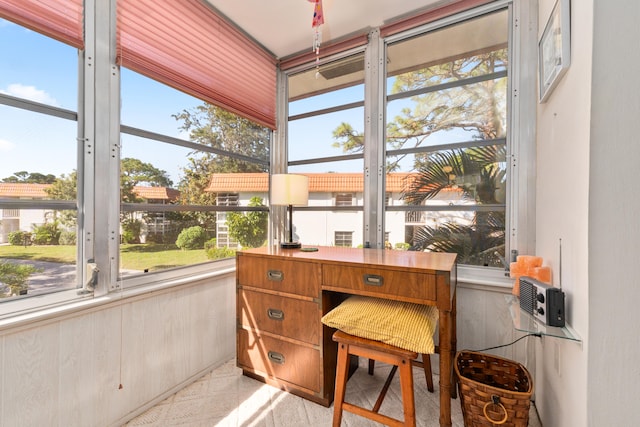 sunroom with plenty of natural light