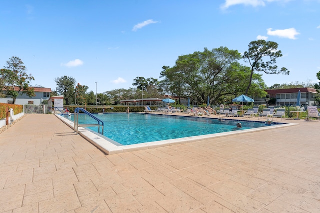 view of pool featuring a patio