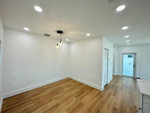 empty room featuring light hardwood / wood-style floors