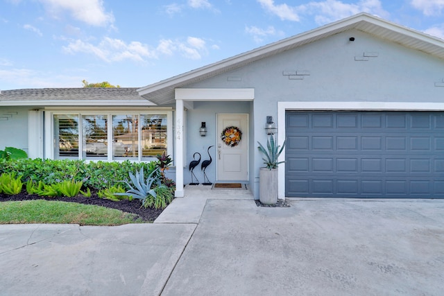 ranch-style home with a garage