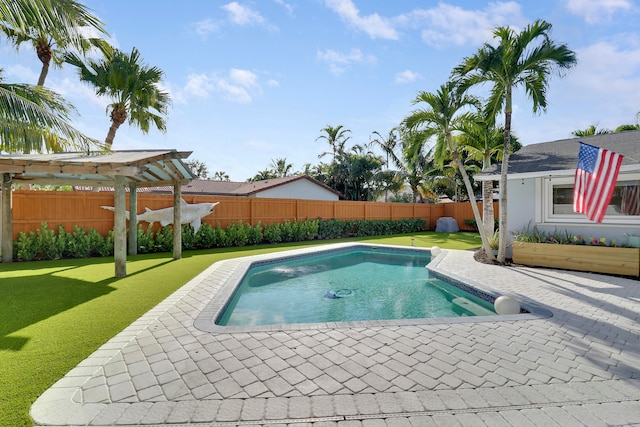 view of swimming pool featuring a pergola, a patio area, and a yard