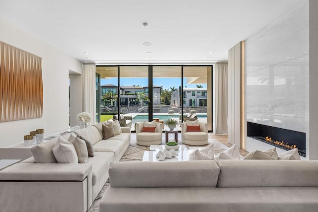 224 W Key Palm Rd, Boca Raton, FL 33432 - living room with expansive windows and a high end fireplace
