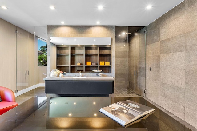 bathroom with tile patterned flooring and sink