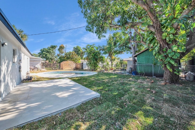 view of yard with a patio and a fenced backyard