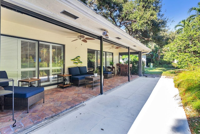 11282 Glen Oaks Ct Unit 31-C, North Palm Beach, FL 33408 - view of patio / terrace featuring an outdoor hangout area, ceiling fan, and outdoor dining space