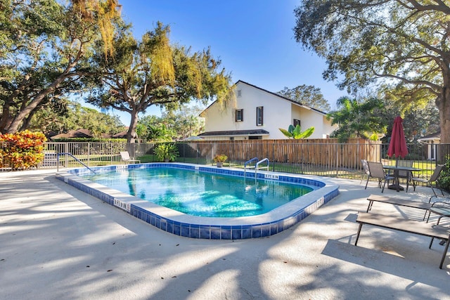 11282 Glen Oaks Ct Unit 31-C, North Palm Beach, FL 33408 - community pool with a patio area