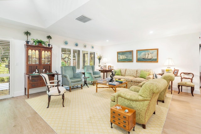 11282 Glen Oaks Ct Unit 31-C, North Palm Beach, FL 33408 - living area with light wood-style flooring, baseboards, ornamental molding, and recessed lighting