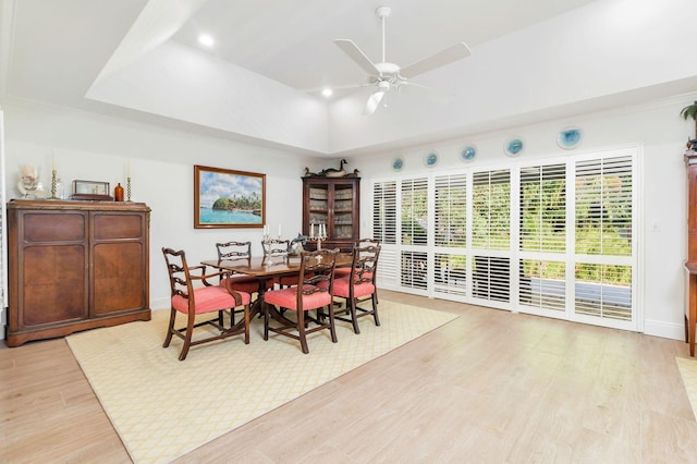 11282 Glen Oaks Ct Unit 31-C, North Palm Beach, FL 33408 - dining area featuring ceiling fan, light wood-style floors, baseboards, a tray ceiling, and recessed lighting