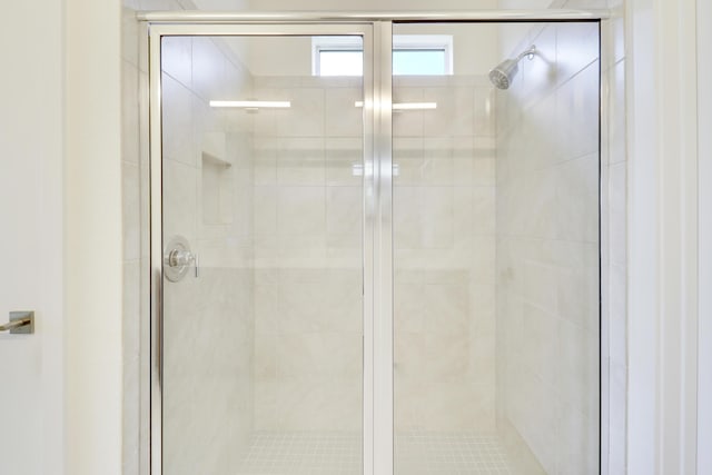 bathroom featuring walk in shower