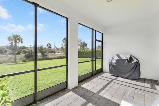 view of unfurnished sunroom