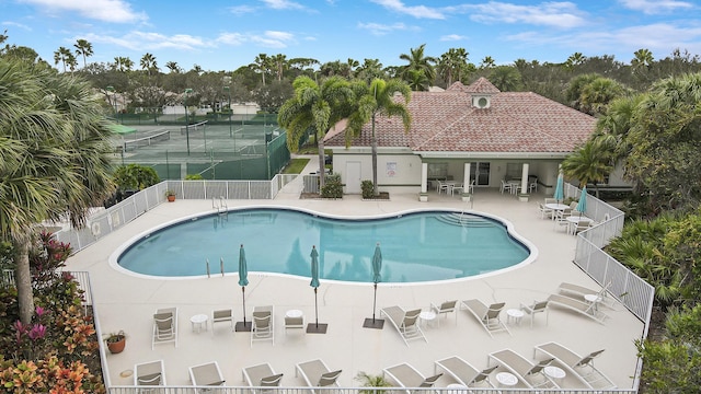 view of swimming pool featuring a patio