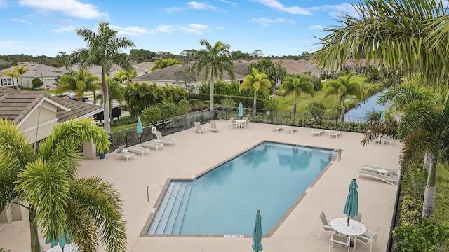 view of swimming pool with a patio area