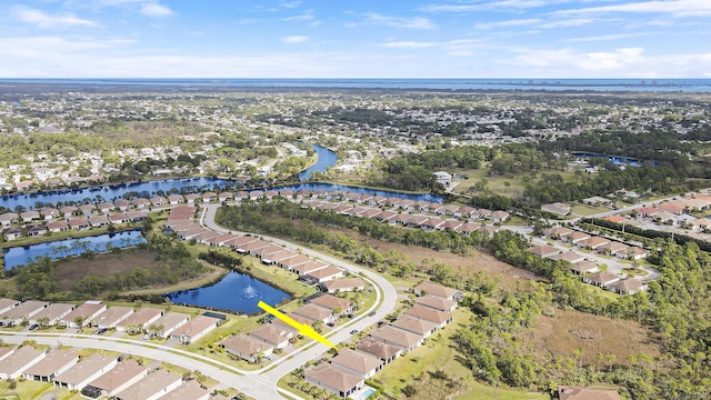 aerial view featuring a water view