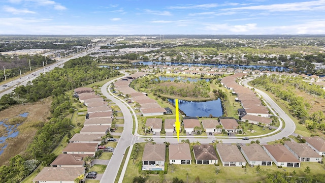 drone / aerial view with a water view