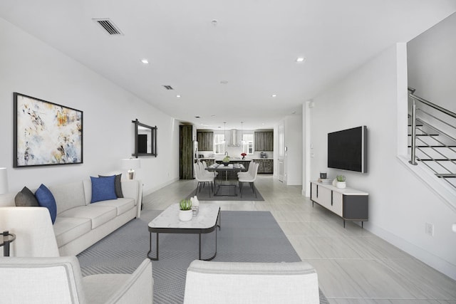 living room with light tile patterned floors