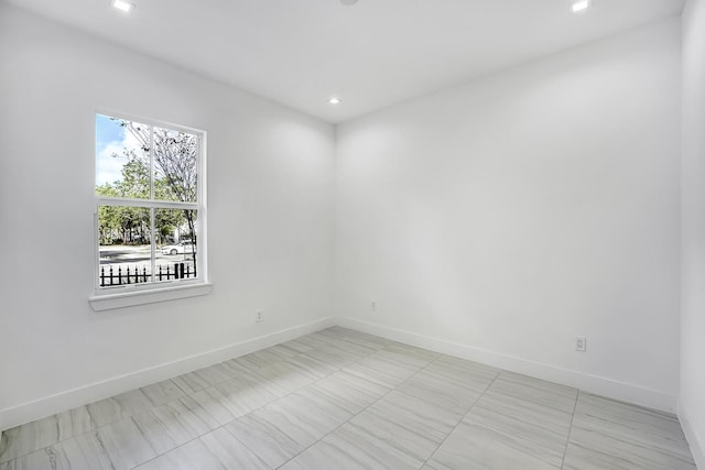 spare room with a wealth of natural light