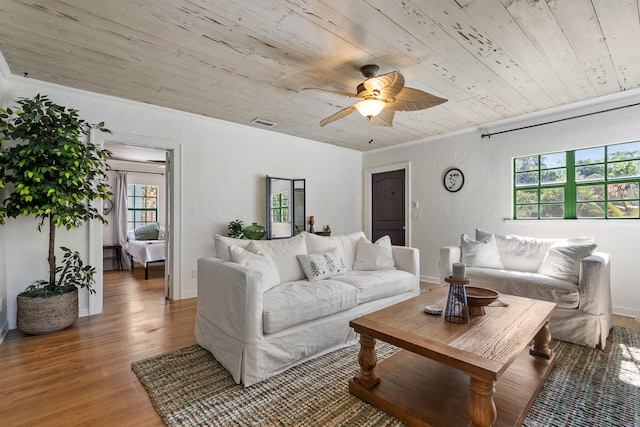 living room with a wealth of natural light, ceiling fan, wood ceiling, and hardwood / wood-style flooring